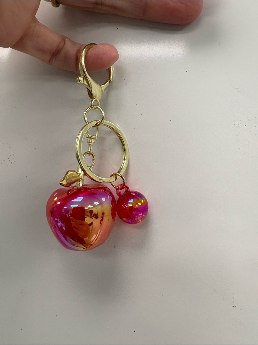 Iridescent Pink Apple Keychain Bag Charm with Rhinestone Leaf Accent